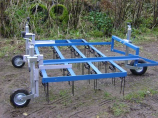 New for 2016! 5ft wide towing grass harrow, with four rows of spring tines and wheel mounted - £395.